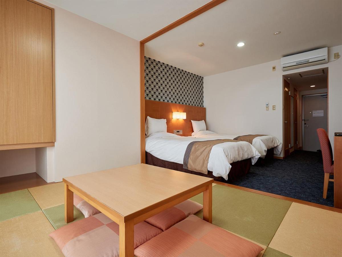 יומיטאן Hotel Murasakimura מראה חיצוני תמונה