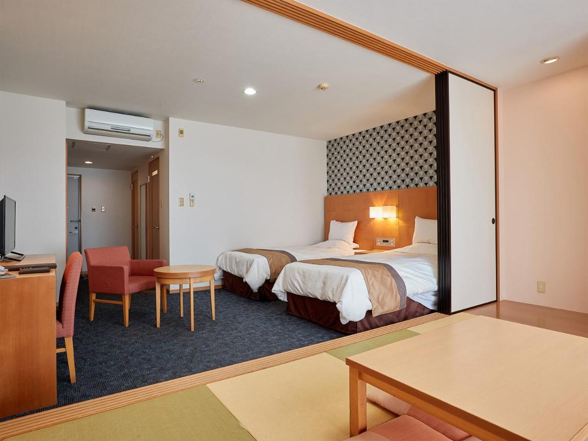 יומיטאן Hotel Murasakimura מראה חיצוני תמונה